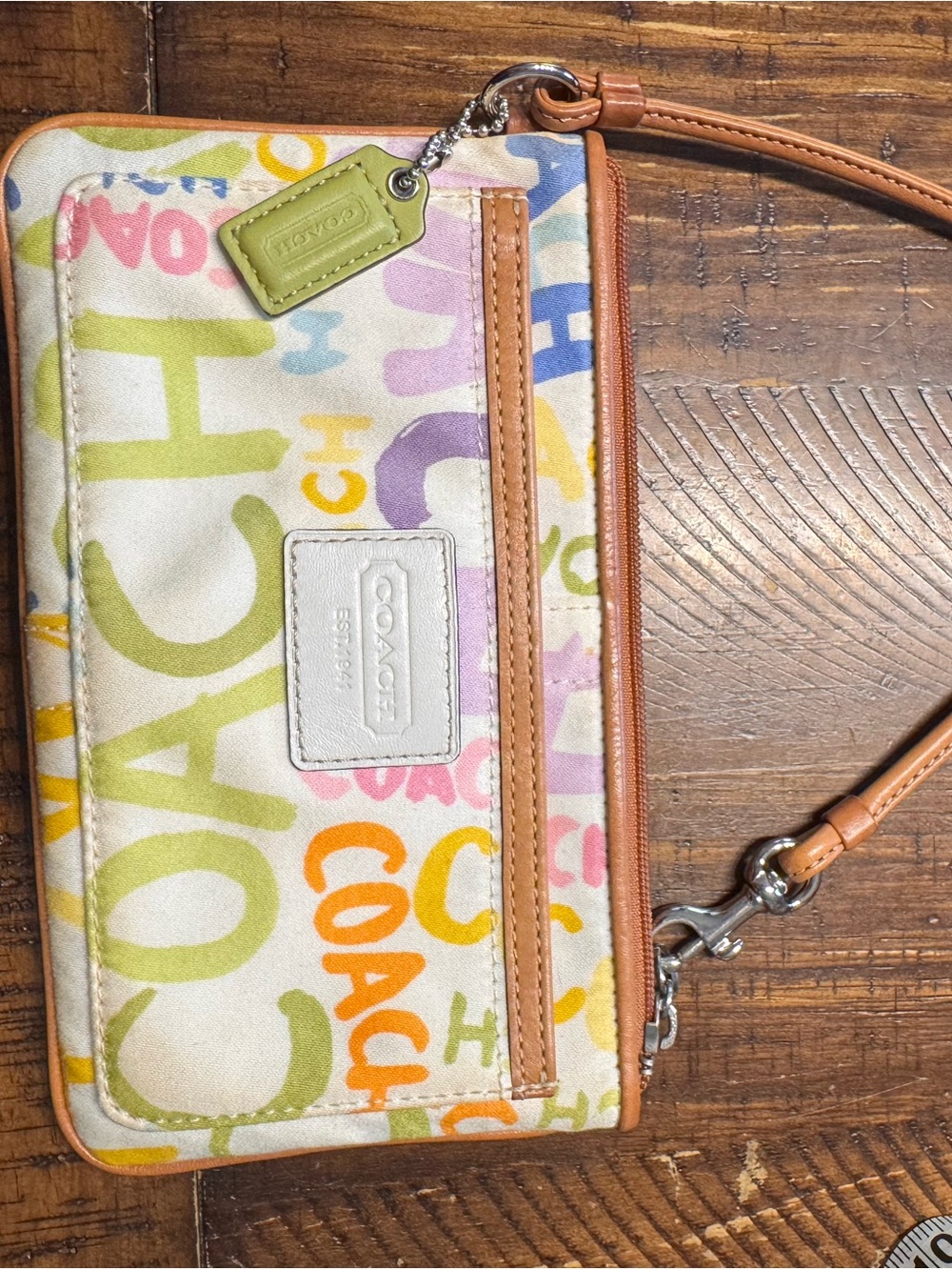 COACH Multicolor Pastel Logo Canvas Wristlet with Tan Leather Trim